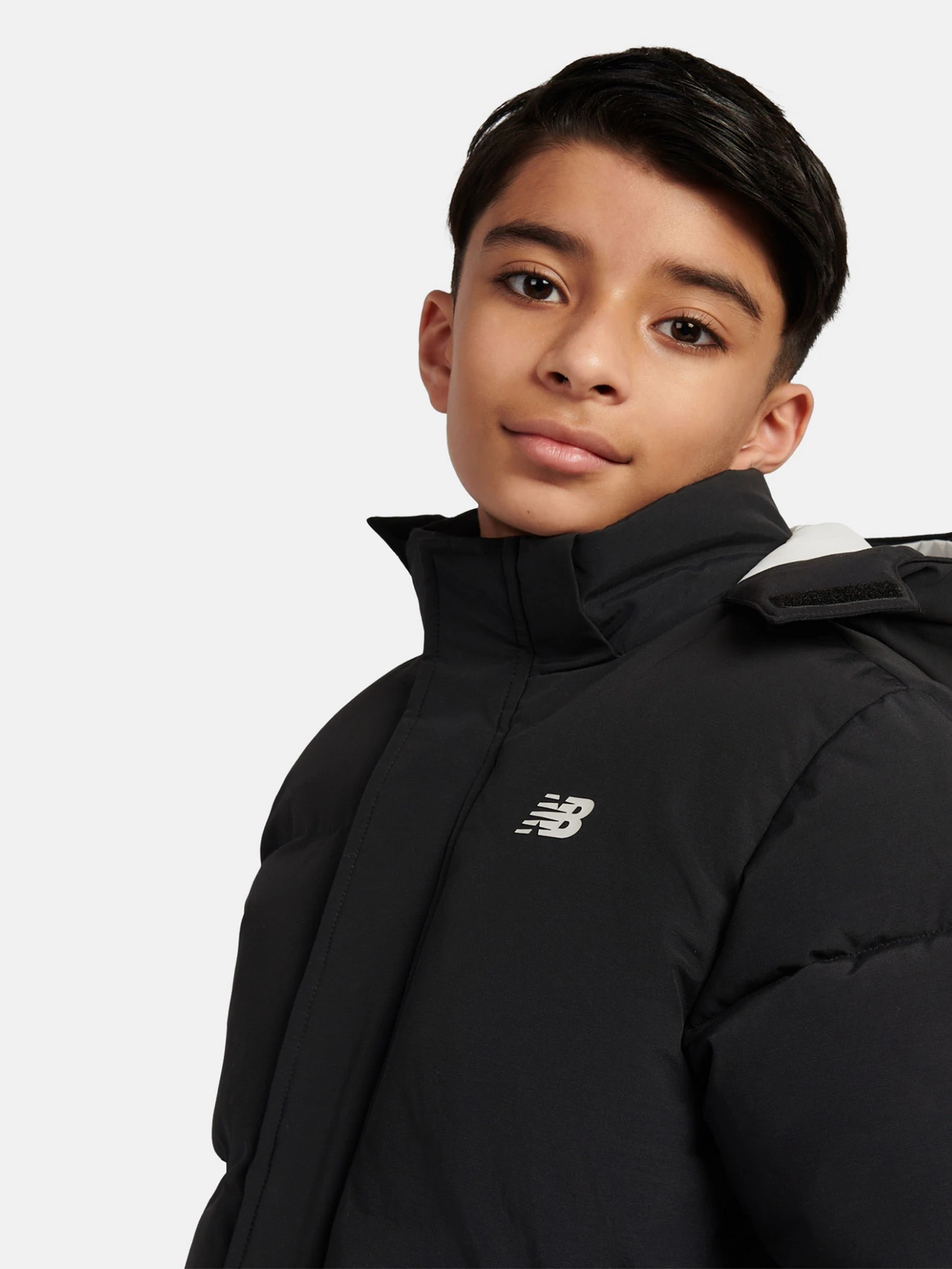 Куртки та дублянки New Balance WADDED PUFFA COAT модель LAKB0287BK Куртки та дублянки New Balance WADDED PUFFA COAT модель LAKB0287BK Фото