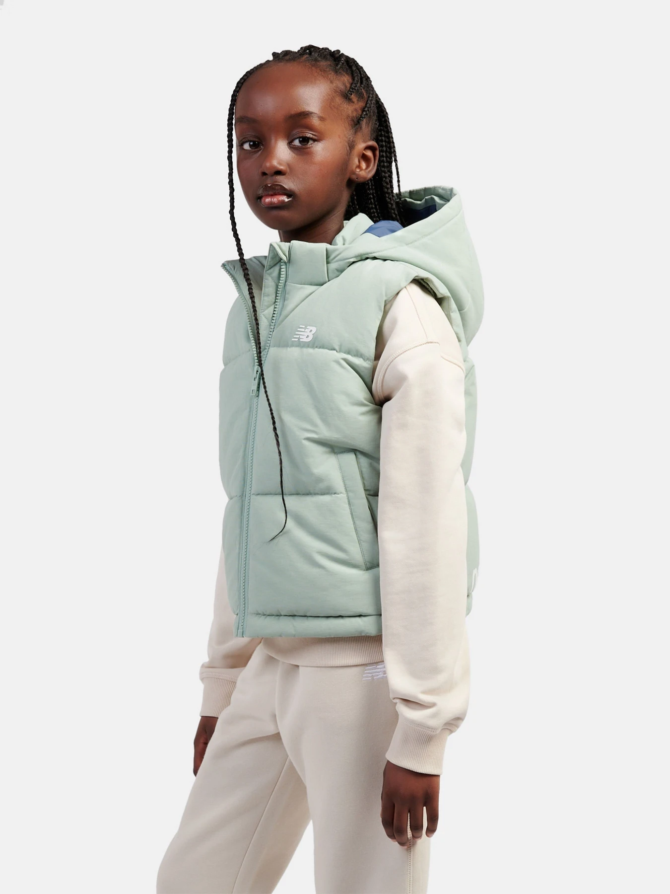 Куртки та дублянки New Balance WIDE BAFFLE SMALL LOGO модель LAKG0228MCN Куртки та дублянки New Balance WIDE BAFFLE SMALL LOGO модель LAKG0228MCN Фото