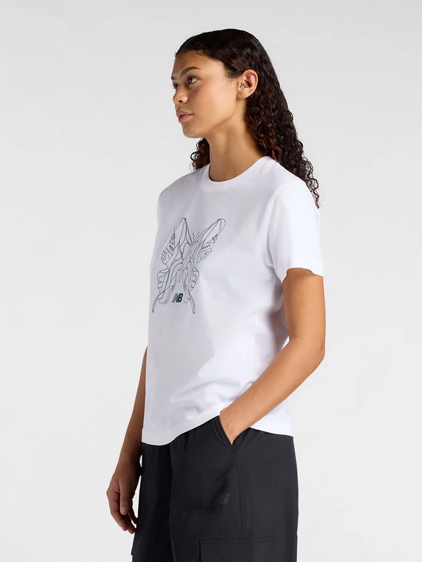 Футболки и поло New Balance модель WT61M6WOWT Футболки и поло New Balance модель WT61M6WOWT Фото