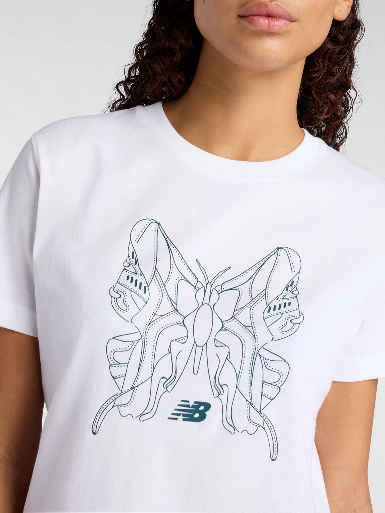 Футболки и поло New Balance модель WT61M6WOWT Футболки и поло New Balance модель WT61M6WOWT Фото