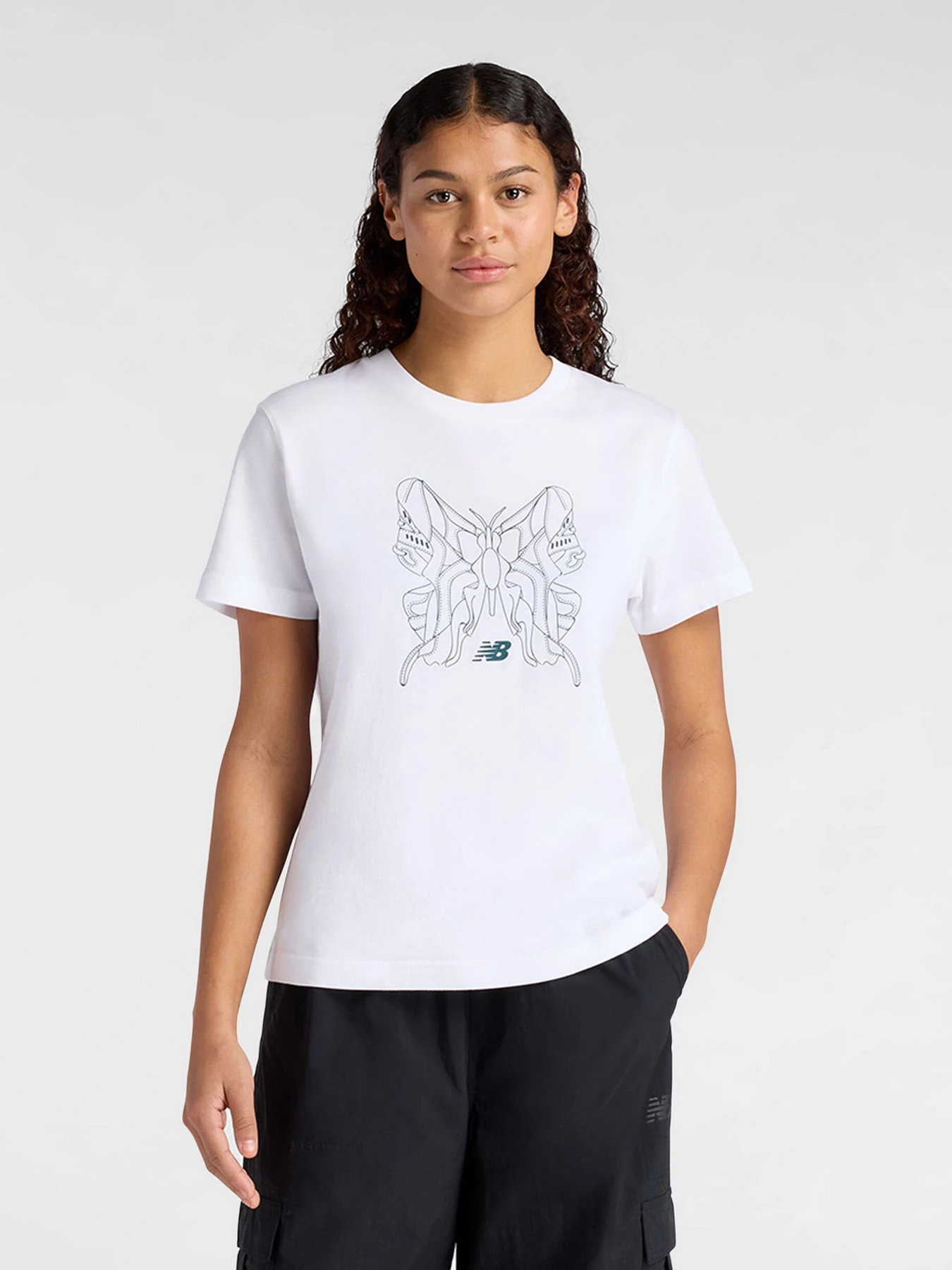 Футболки и поло New Balance модель WT61M6WOWT Футболки и поло New Balance модель WT61M6WOWT Фото