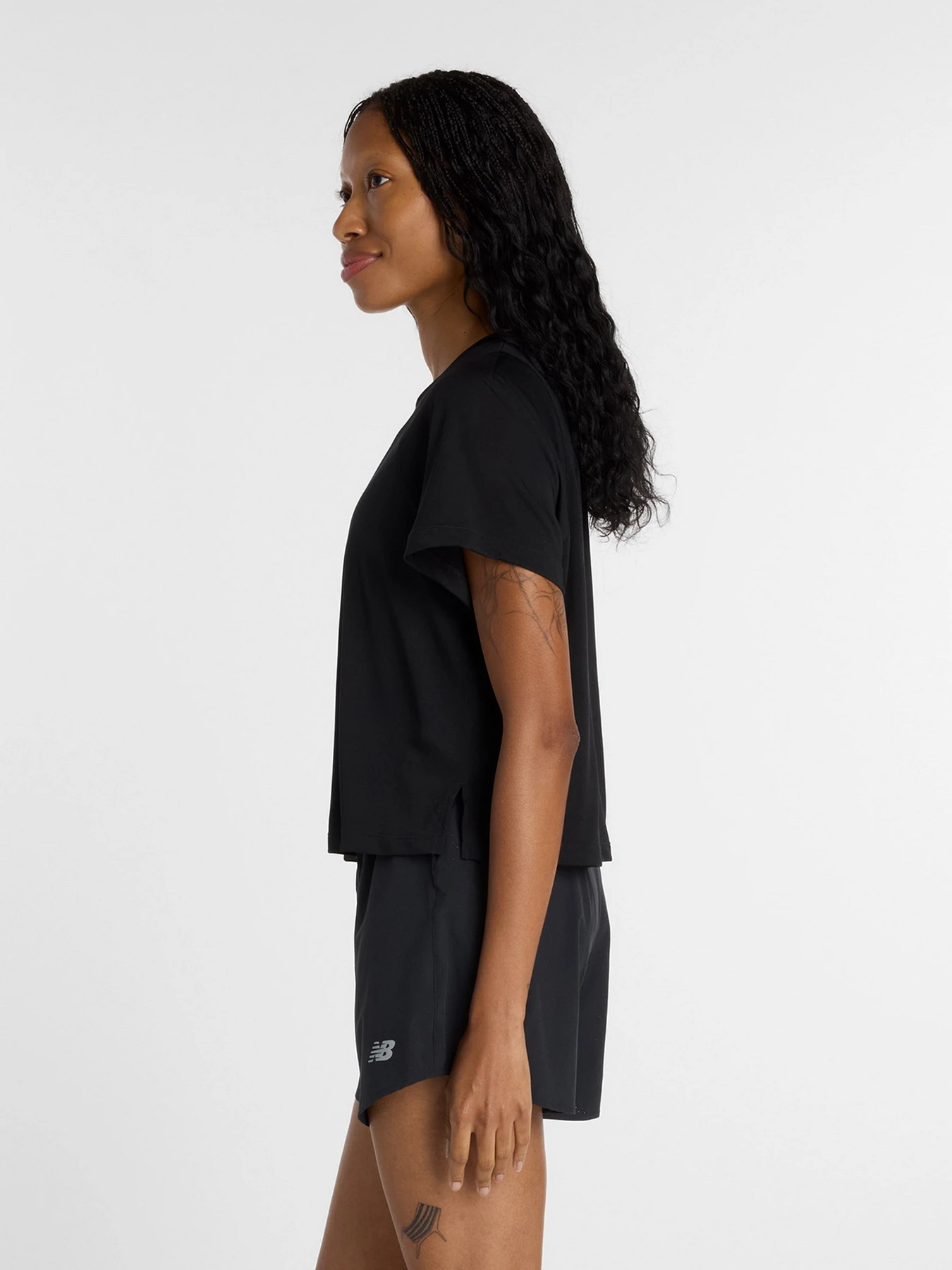 Футболки и поло New Balance модель WT61A31KBK Футболки и поло New Balance модель WT61A31KBK Фото