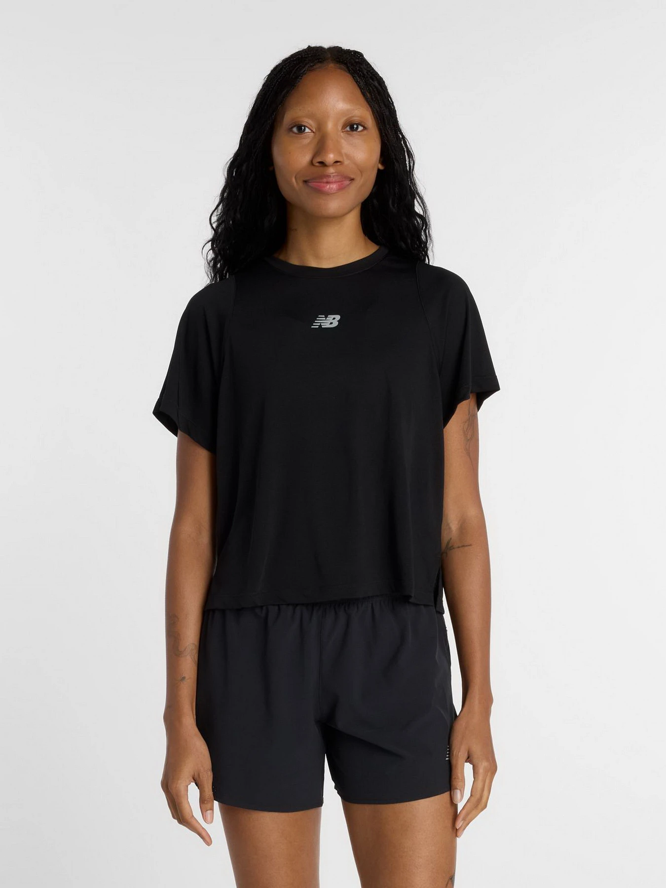 Футболки и поло New Balance модель WT61A31KBK Футболки и поло New Balance модель WT61A31KBK Фото