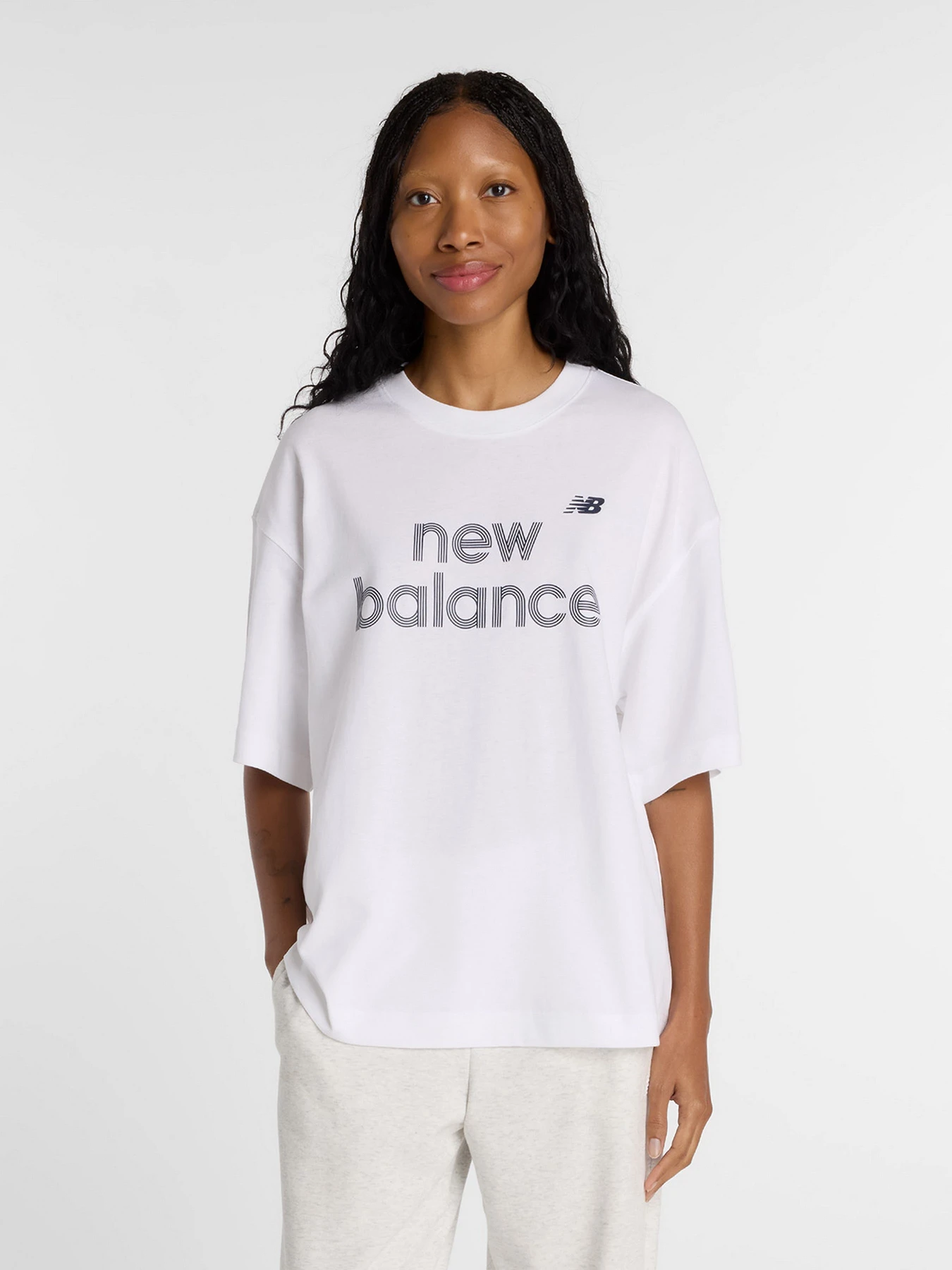 Футболки и поло New Balance модель WT61L713WT Футболки и поло New Balance модель WT61L713WT Фото