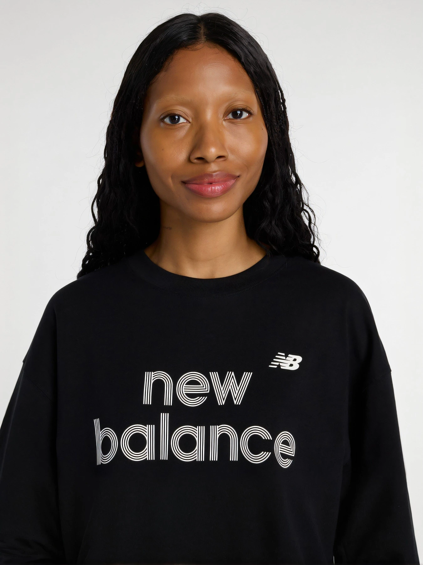 Футболки и поло New Balance модель WT61L713BK Футболки и поло New Balance модель WT61L713BK Фото