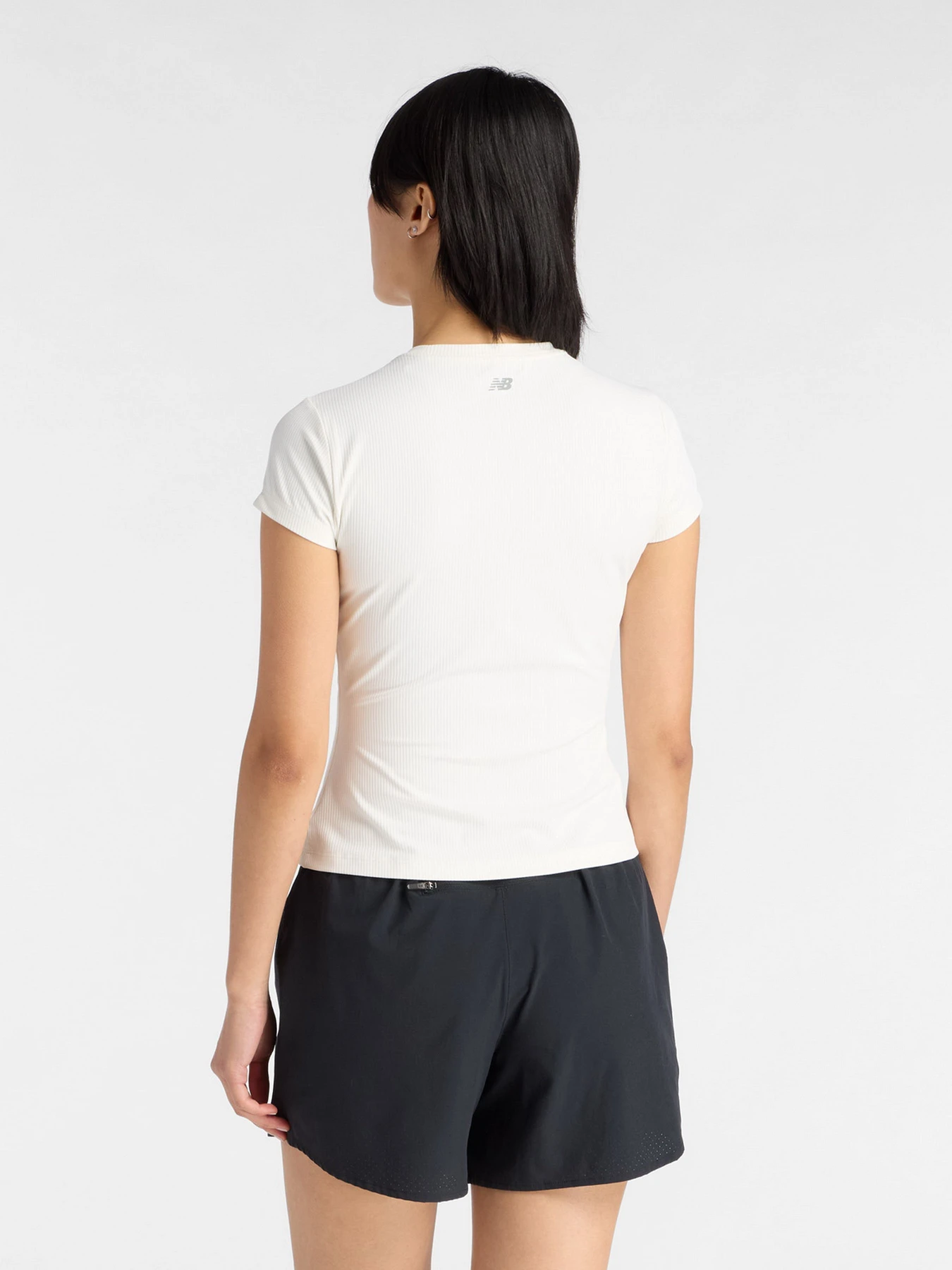 Футболки и поло New Balance модель WT53125SST Футболки и поло New Balance модель WT53125SST Фото