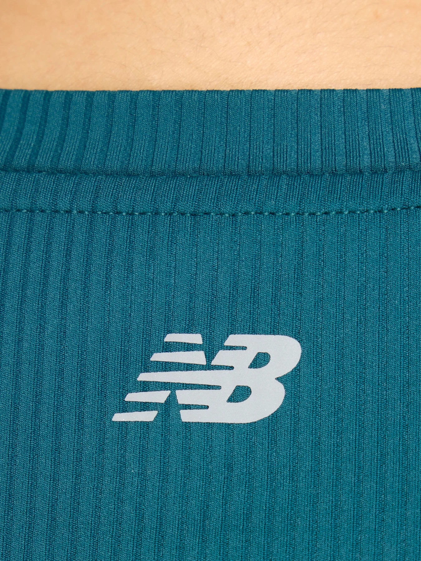 Футболки и поло New Balance модель WT53125AAV Футболки и поло New Balance модель WT53125AAV Фото