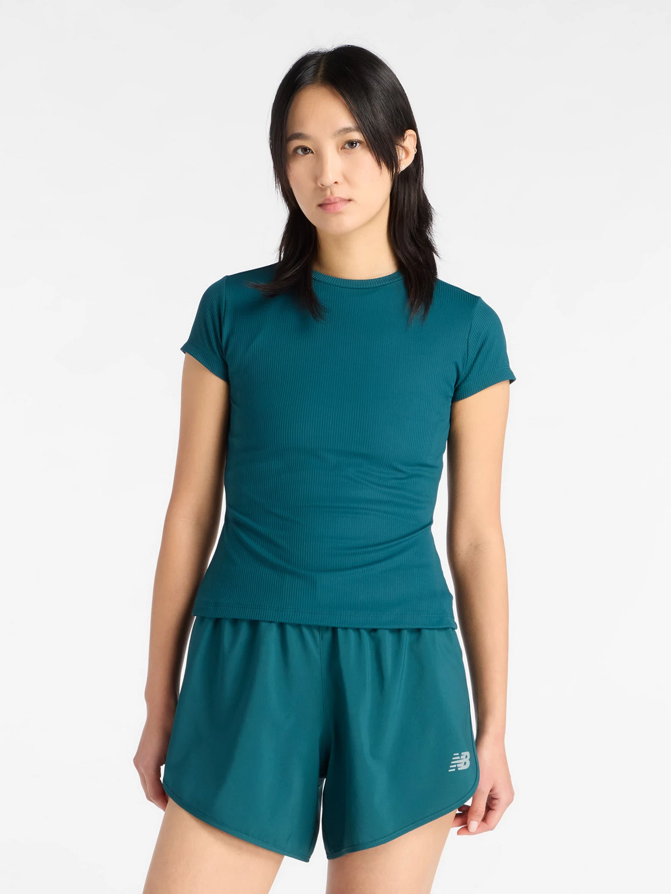 Футболки и поло New Balance модель WT53125AAV Футболки и поло New Balance модель WT53125AAV Фото