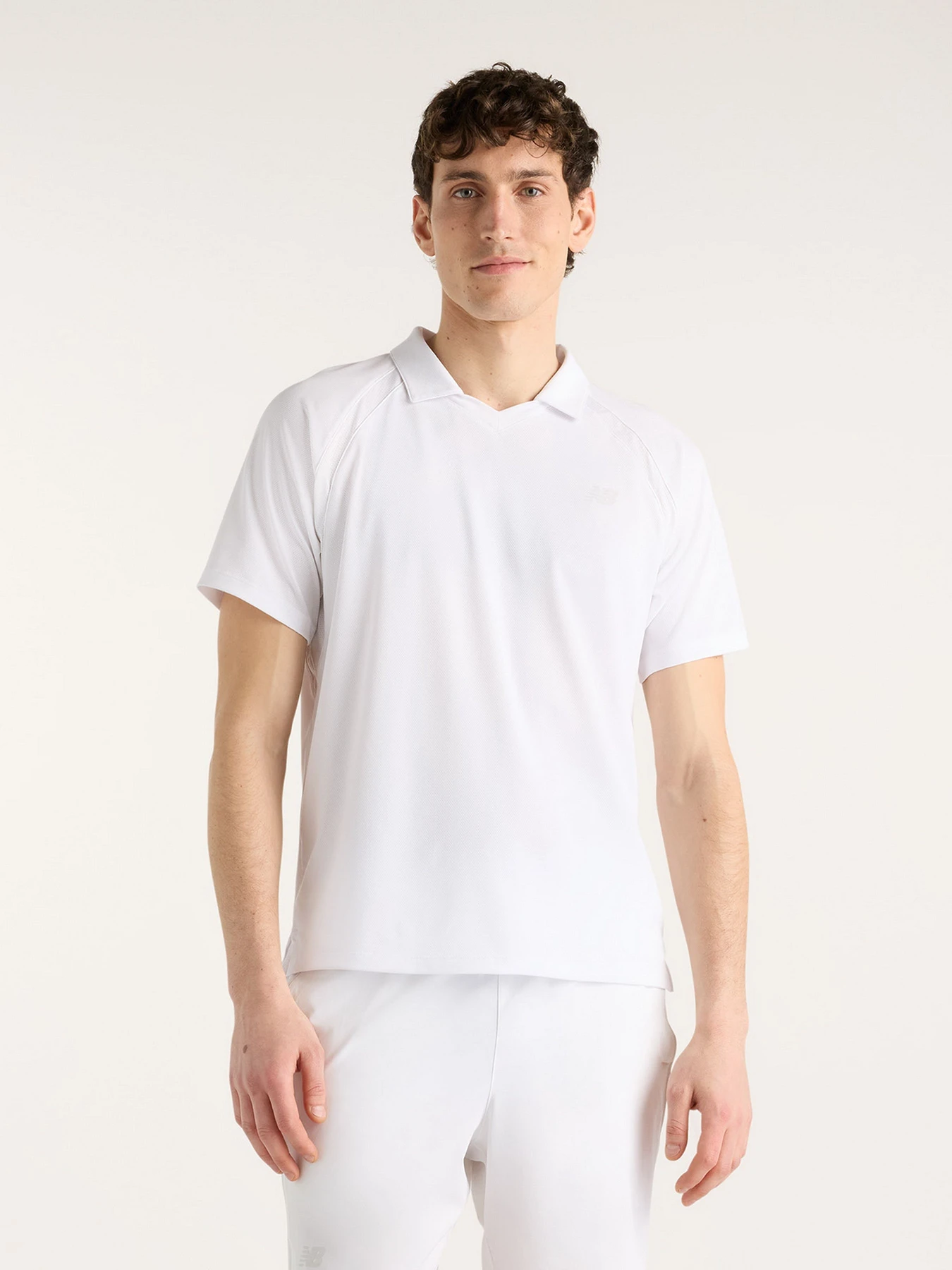 Футболки и поло New Balance модель MT61W0HTWT Футболки и поло New Balance модель MT61W0HTWT Фото