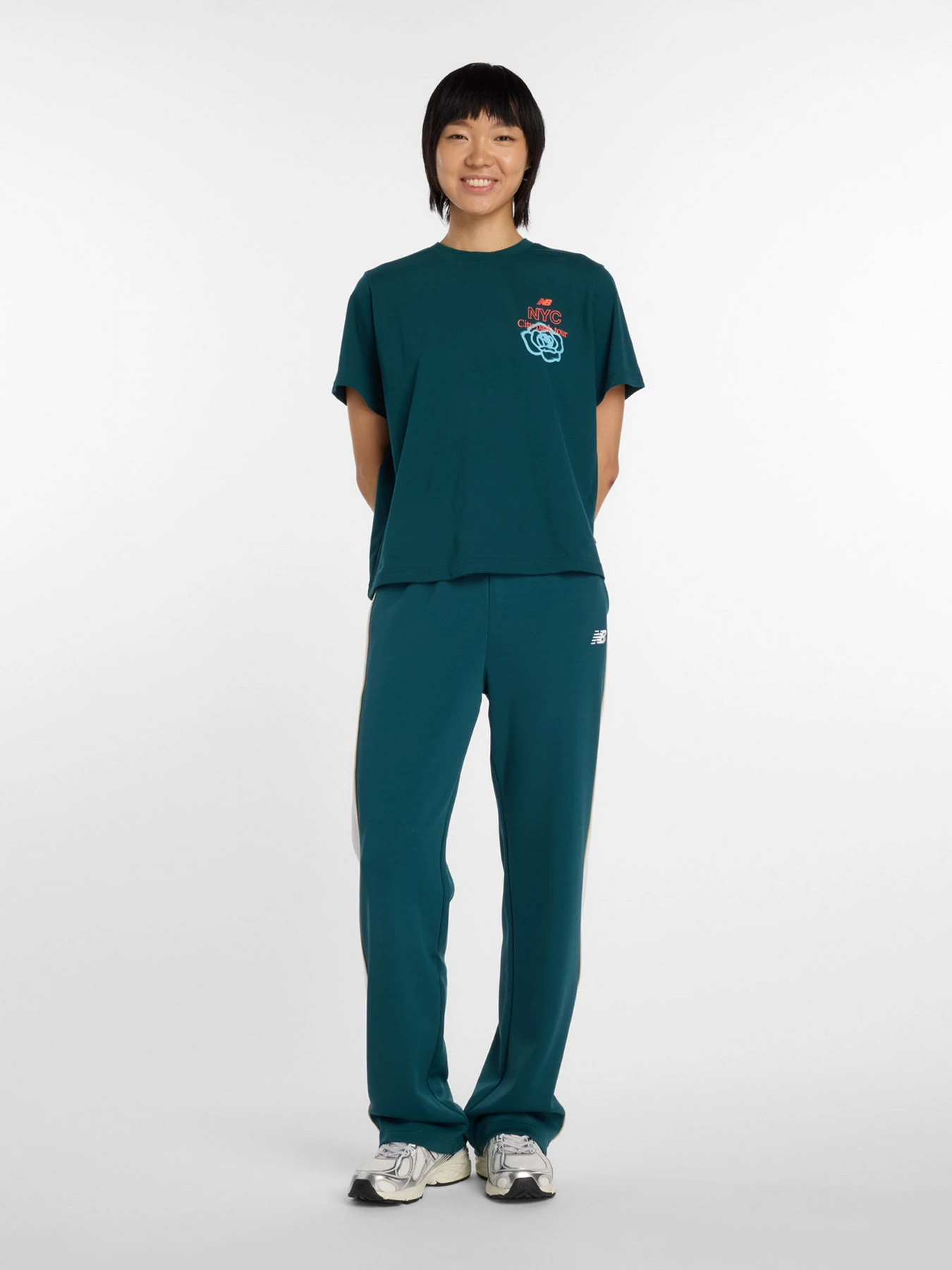 Штани New Balance модель WB61Q2R4AAV Штани New Balance модель WB61Q2R4AAV Фото