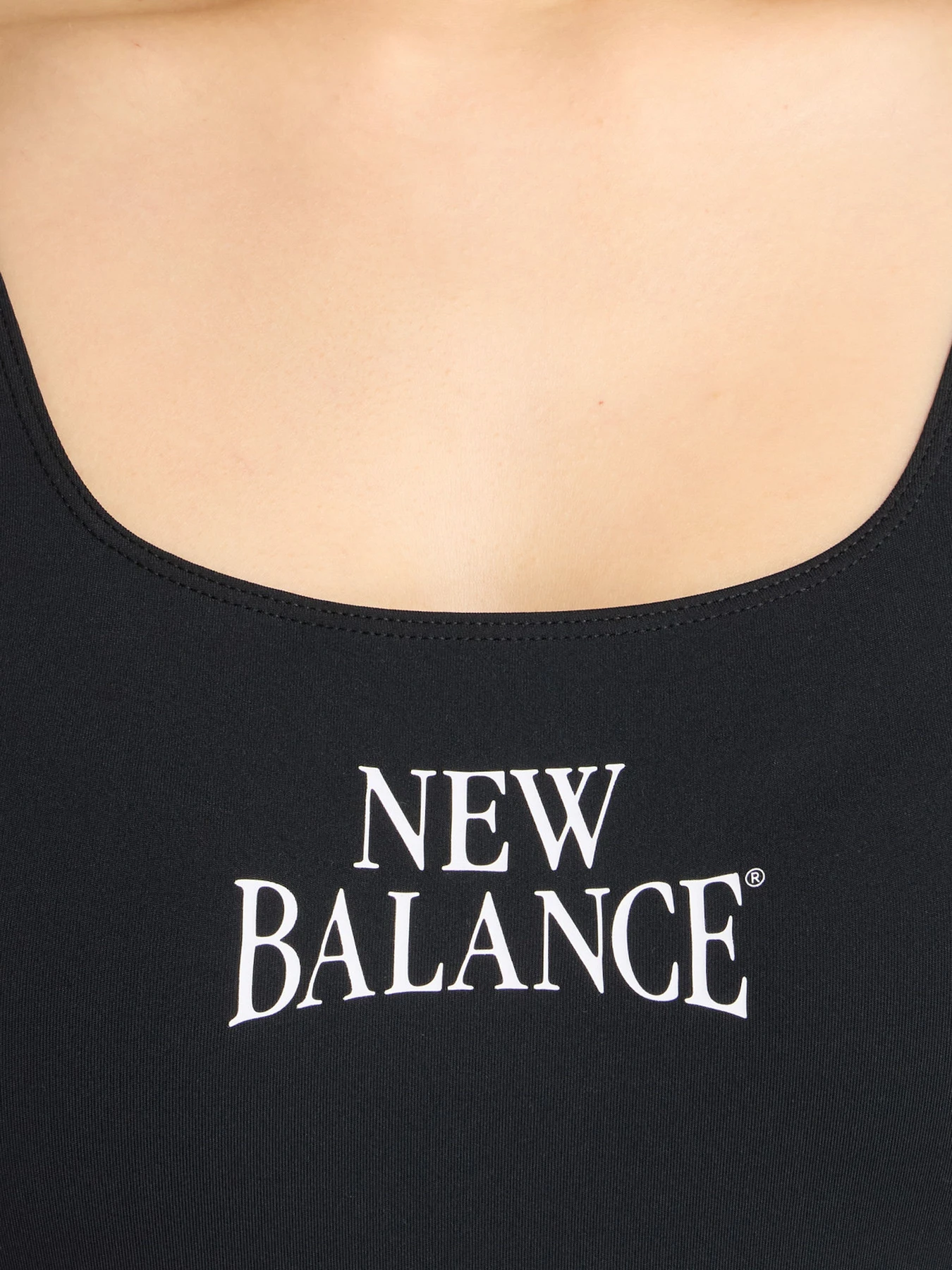 Футболки и поло New Balance Trackside Bodysuit модель WS61T61OBK Футболки и поло New Balance Trackside Bodysuit модель WS61T61OBK Фото