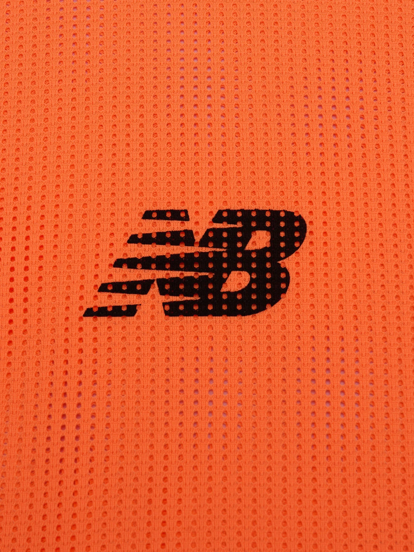 Футболки и поло New Balance модель MT6222GVFLO Футболки и поло New Balance модель MT6222GVFLO Фото