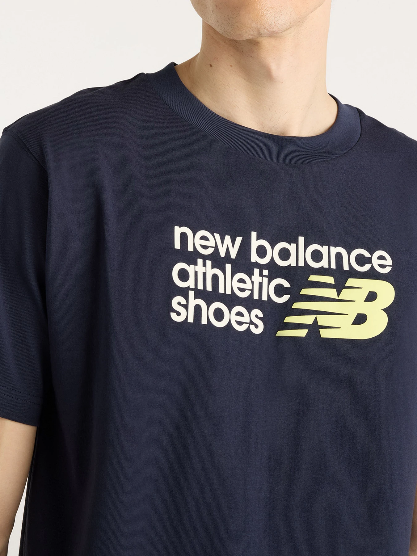 Футболки и поло New Balance модель MT51900DNT Фото