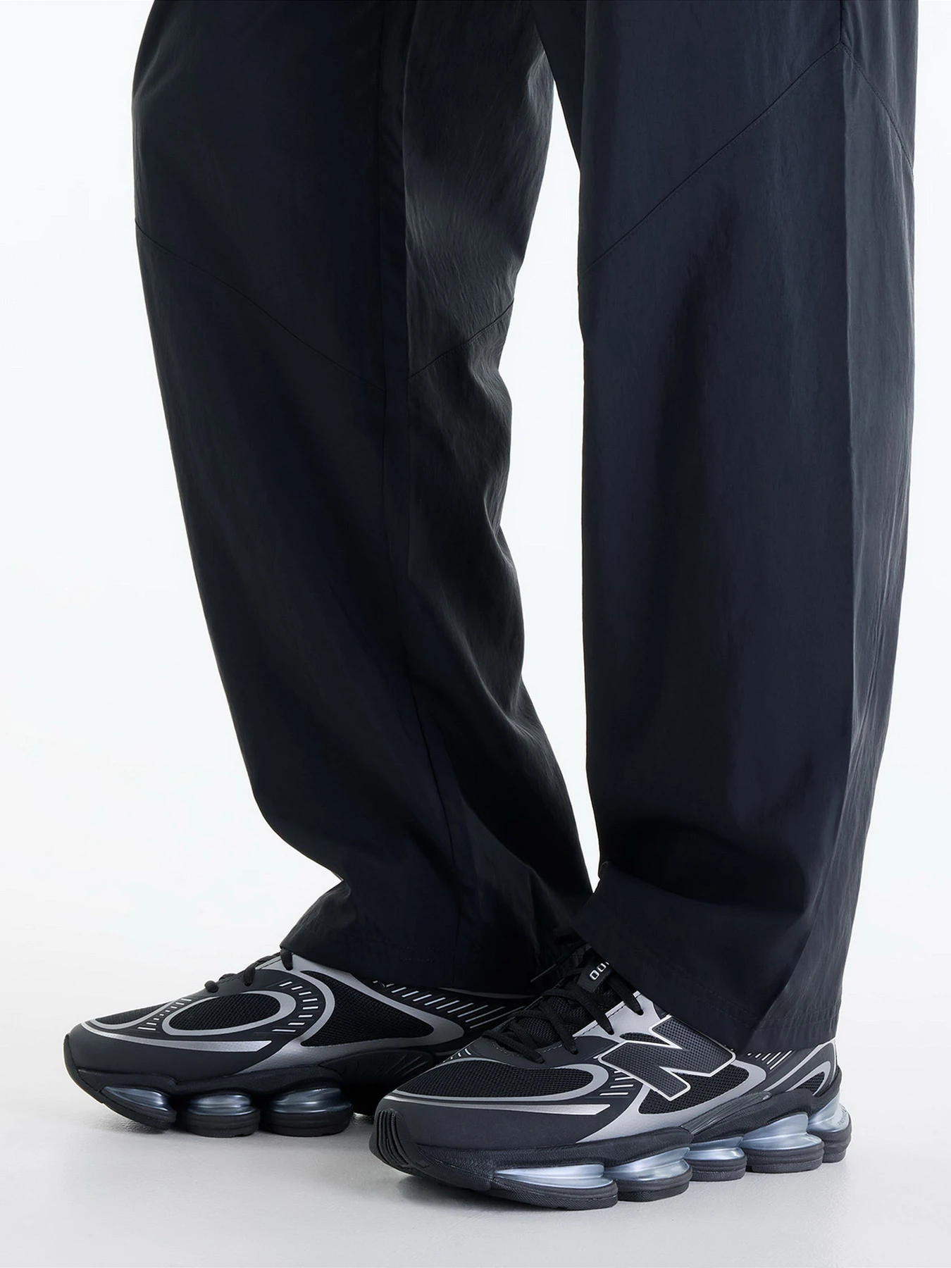 Брюки New Balance модель MB61R010BKK Брюки New Balance модель MB61R010BKK Фото
