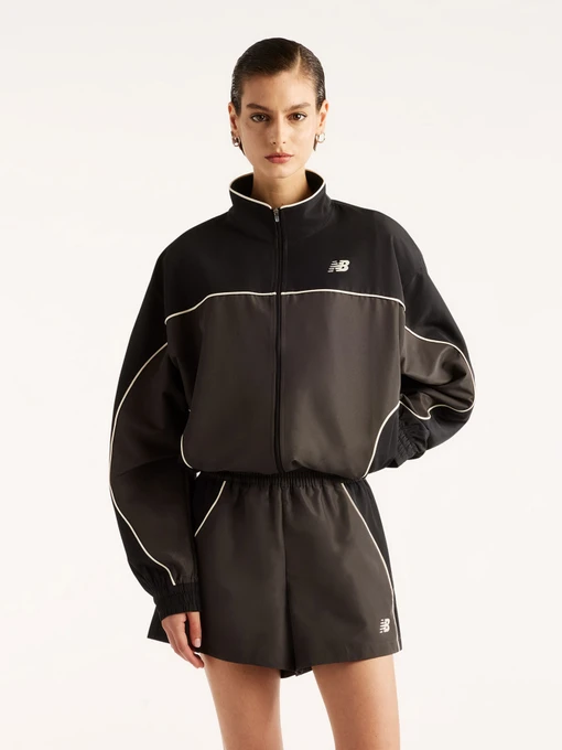 Куртки та дублянки New Balance модель WJ6279FYBLK Фото
