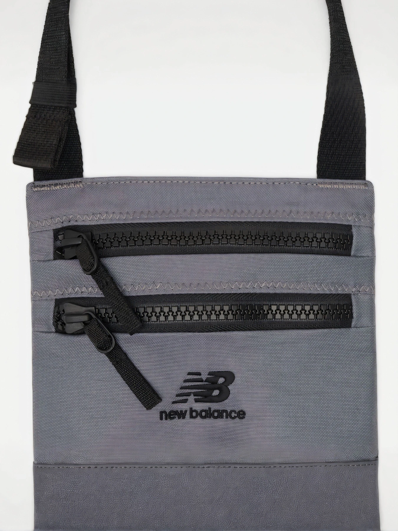 Сумки New Balance Urban Sling Bag модель AC54993AA9 Сумки New Balance Urban Sling Bag модель AC54993AA9 Фото