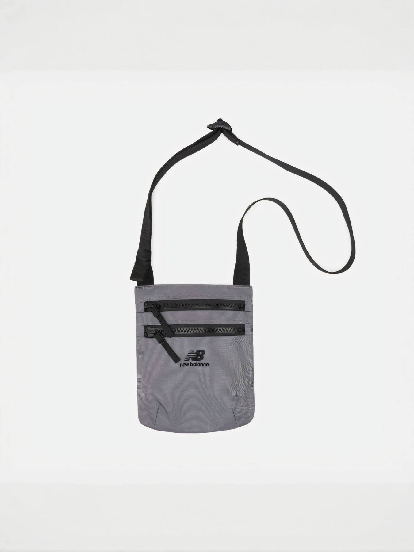 Сумки New Balance Urban Sling Bag модель AC54993AA9 Сумки New Balance Urban Sling Bag модель AC54993AA9 Фото