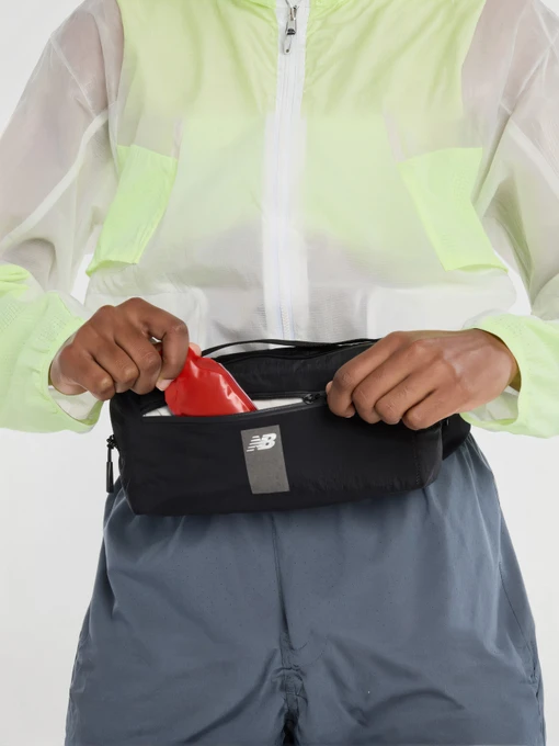 Сумки New Balance Run Sling Belt модель AC8871TBK Фото