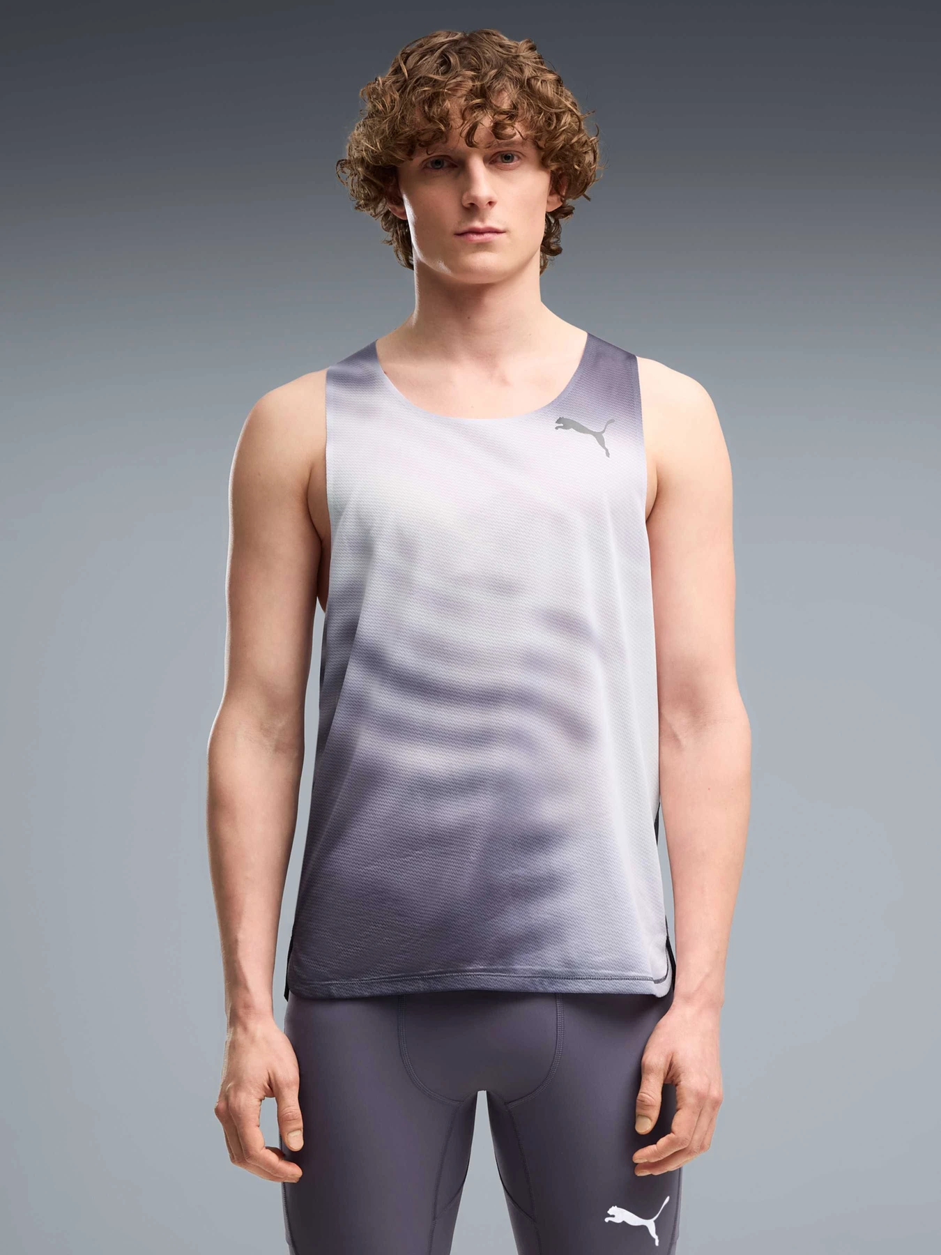Футболки і поло PUMA M Lightspeed Graphic Singlet модель 528715 Футболки і поло PUMA M Lightspeed Graphic Singlet модель 528715 Фото