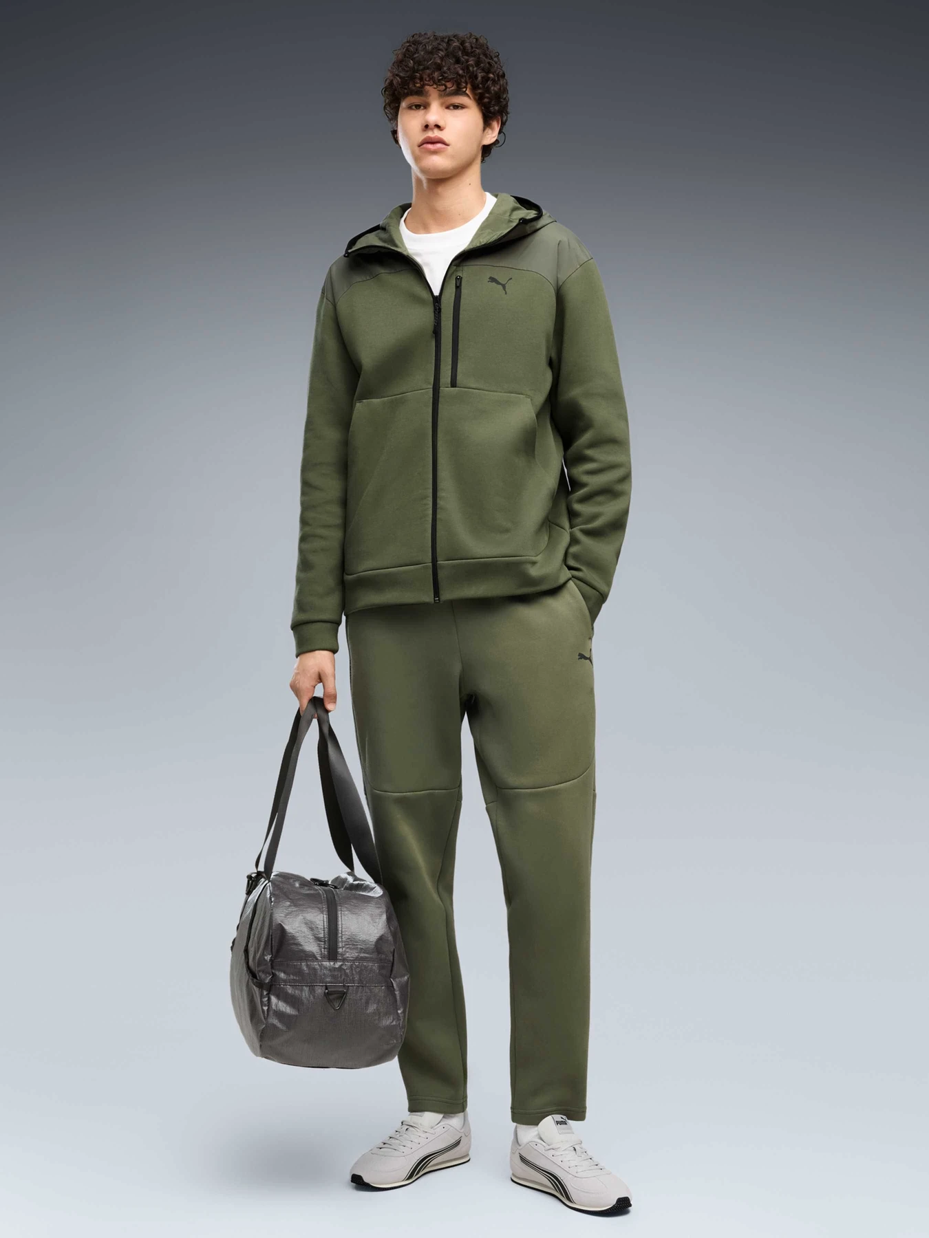 Брюки PUMA Tech Knitted Pants модель 693949 Брюки PUMA Tech Knitted Pants модель 693949 Фото