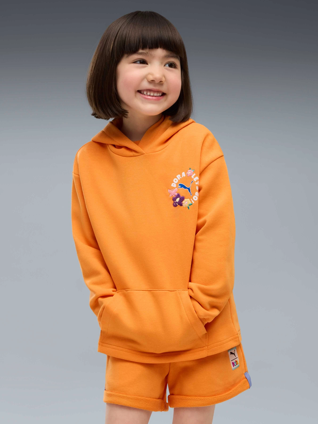 Худі та світшоти PUMA x Dora Hoodie модель 637624 Фото