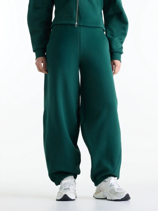 Штани New Balance Athletics Crafted Fleece модель WB62L0NLNOG Фото