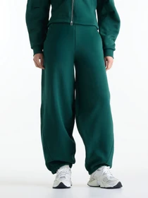 Штани New Balance Athletics Crafted Fleece модель WB62L0NLNOG Фото