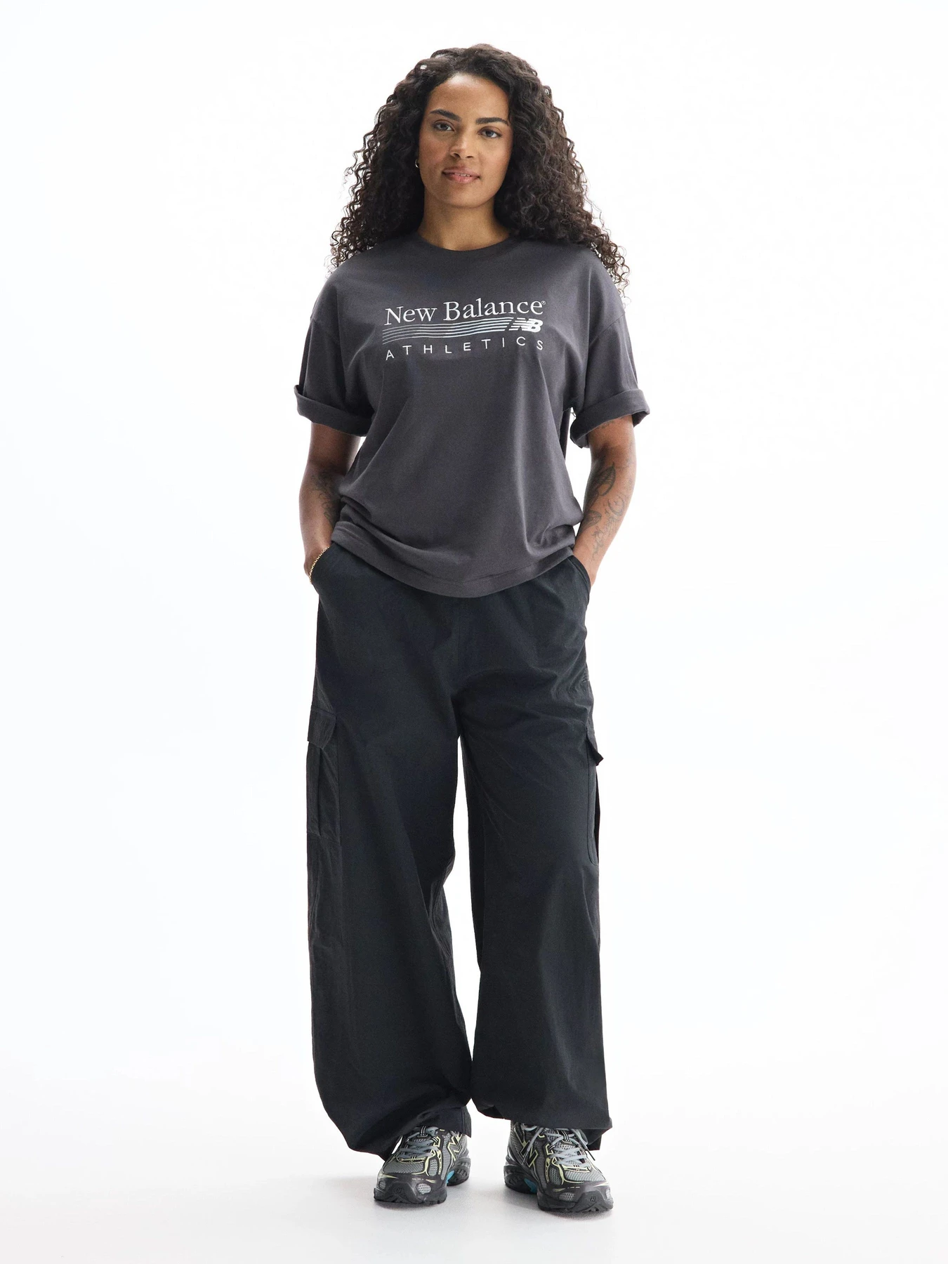 Футболки и поло New Balance Trackside Oversized модель WT6297MKBLK Футболки и поло New Balance Trackside Oversized модель WT6297MKBLK Фото