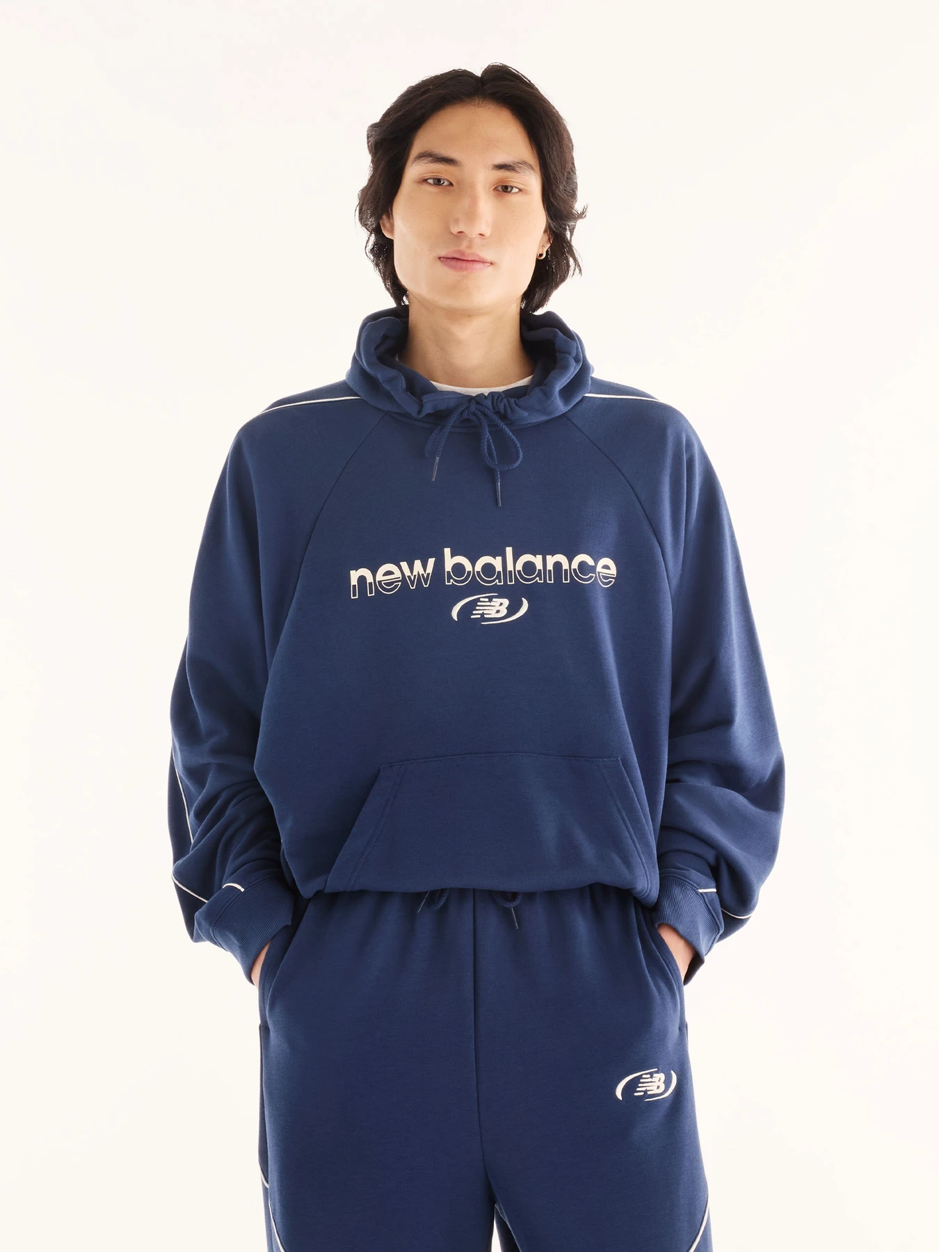 Худи и свитшоты New Balance Trackside French Terry модель MT62W318NNY Фото