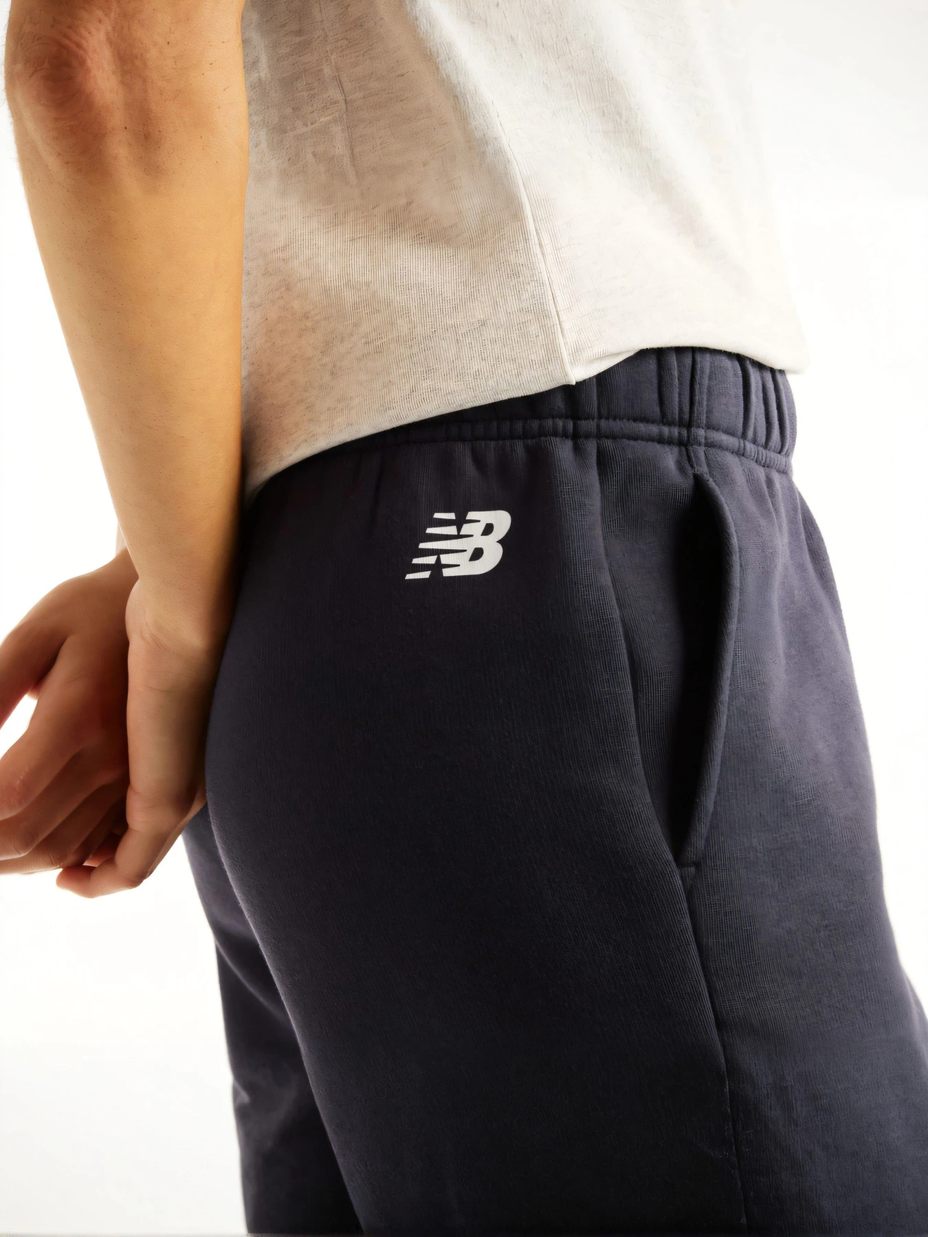 Штани New Balance модель WB62N4SYDNT Штани New Balance модель WB62N4SYDNT Фото