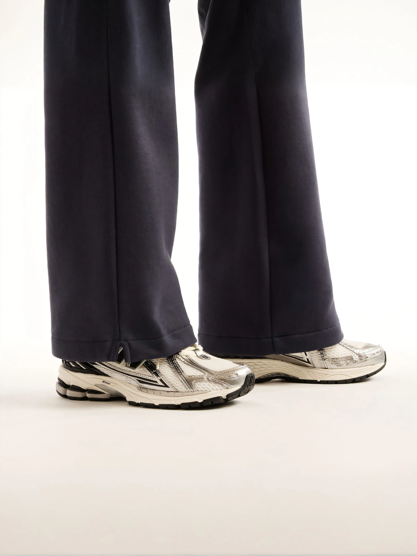 Штани New Balance модель WB62N4SYDNT Штани New Balance модель WB62N4SYDNT Фото