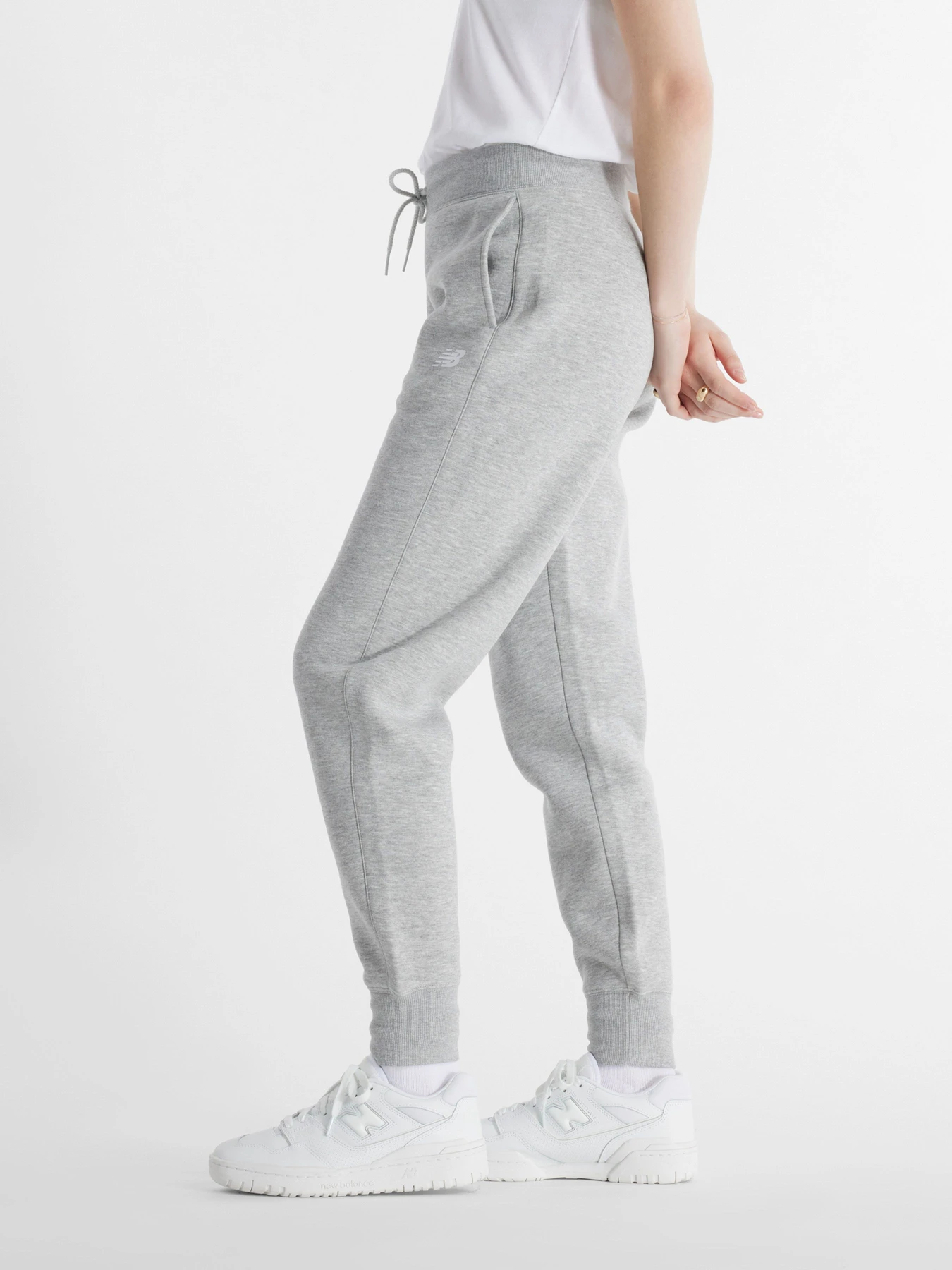 Штани New Balance Sport Fleece Jogger модель WP43805AG Фото
