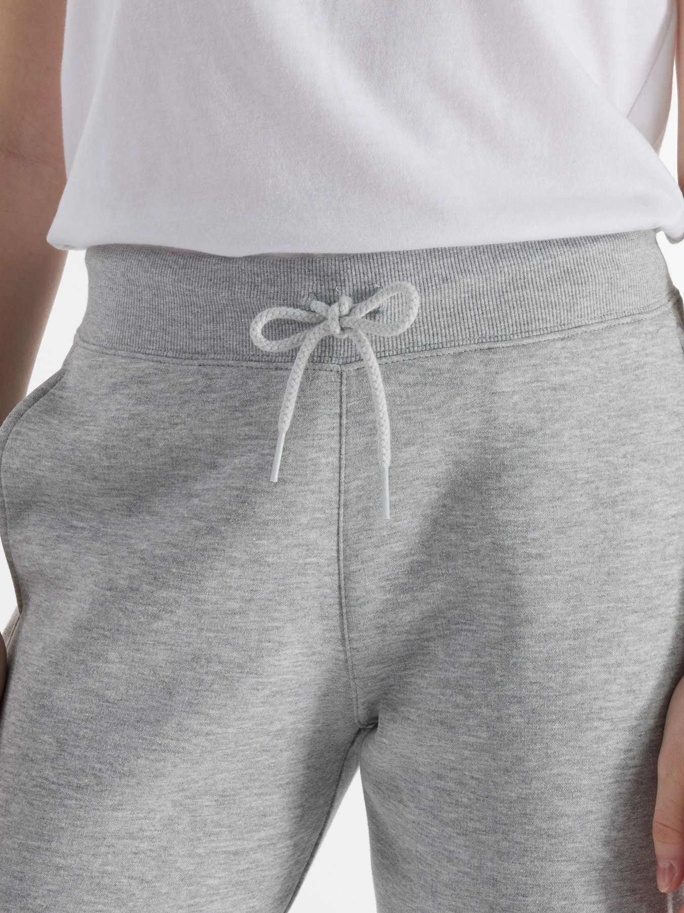 Штани New Balance Sport Fleece Jogger модель WP43805AG Фото