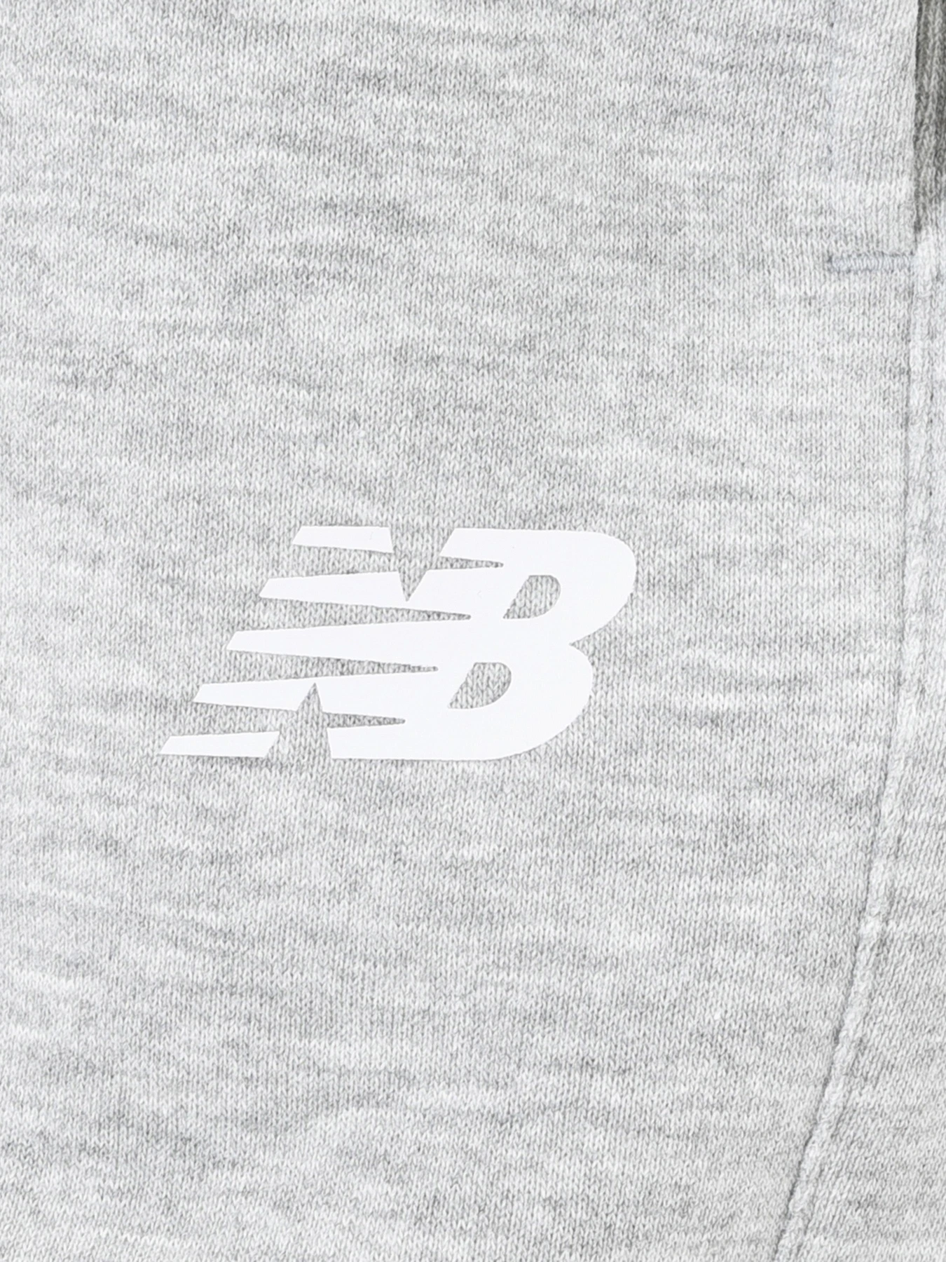 Штани New Balance Sport Fleece Jogger модель WP43805AG Фото