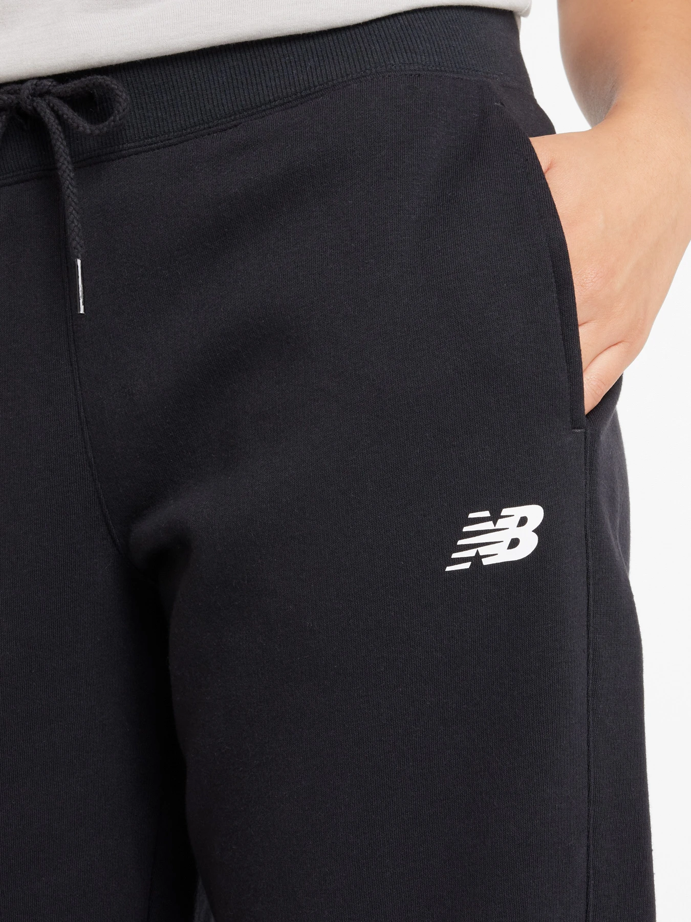 Штани New Balance Sport Fleece Jogger модель WP43805BK Фото