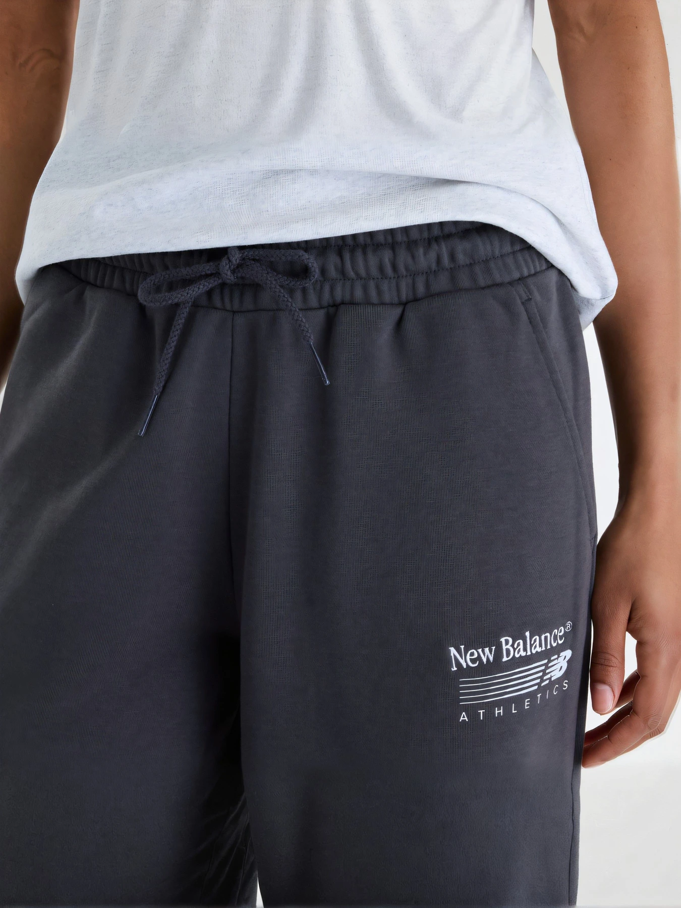 Штани New Balance модель WB62412FBLK Штани New Balance модель WB62412FBLK Фото