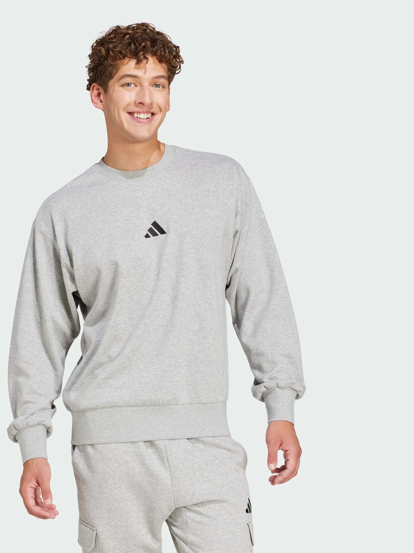Худі та світшоти Adidas Adidas Essentials модель JE3828 Фото