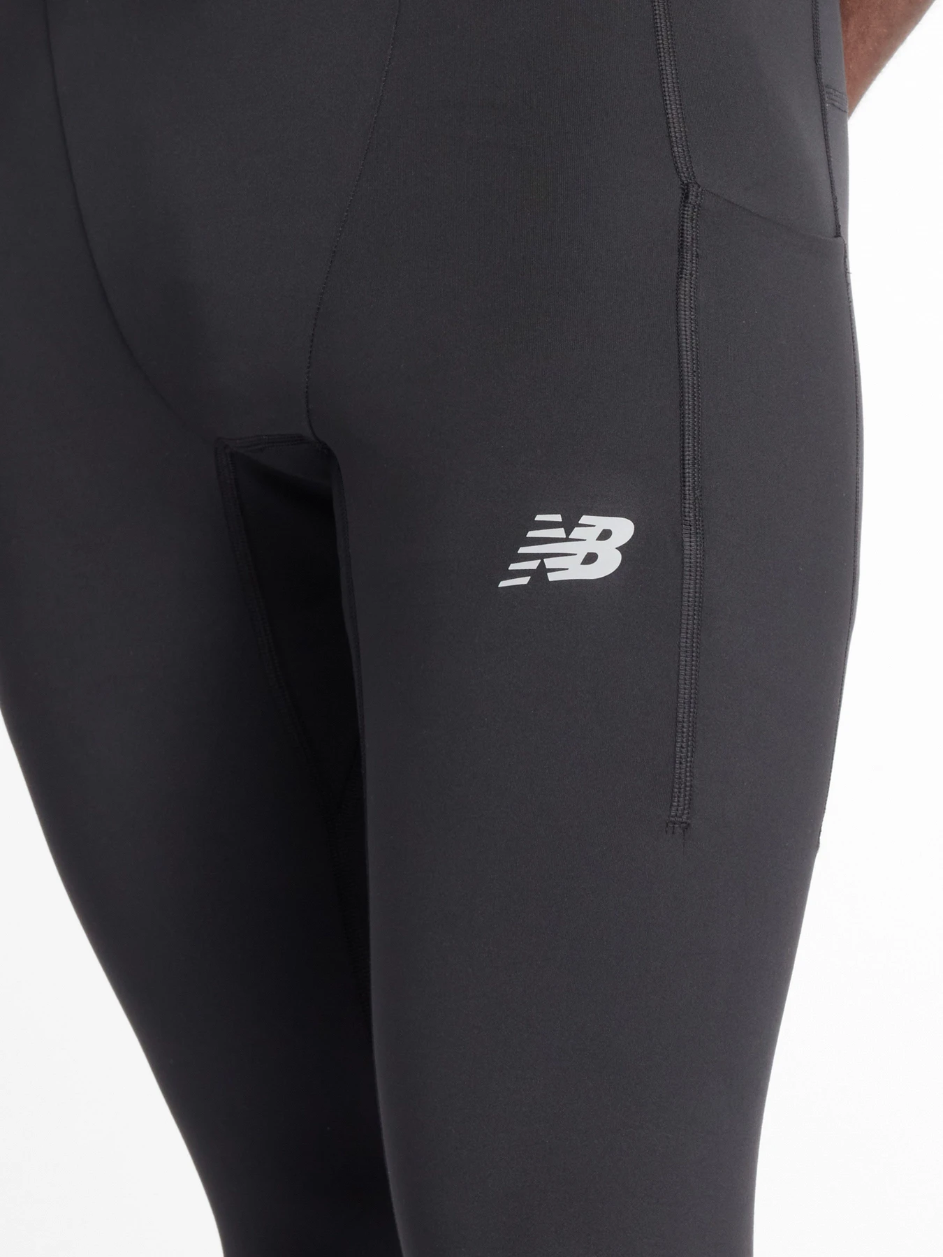 Штани New Balance RC Heat Pocket Tight 27" модель MP43257BK Штани New Balance RC Heat Pocket Tight 27" модель MP43257BK Фото
